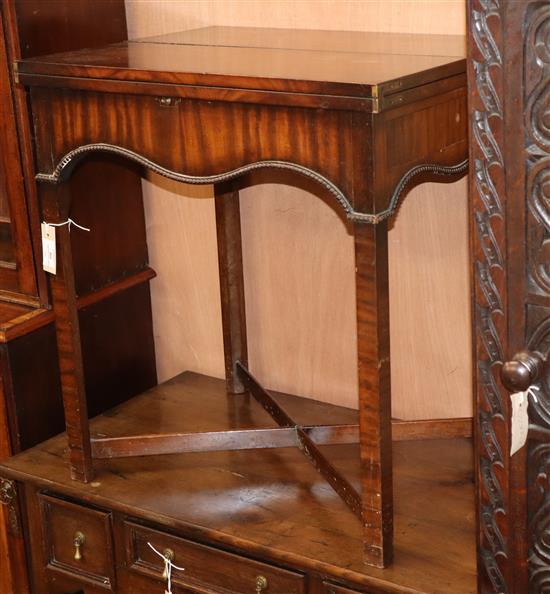 A 1920s mahogany folding tea table W.59cm